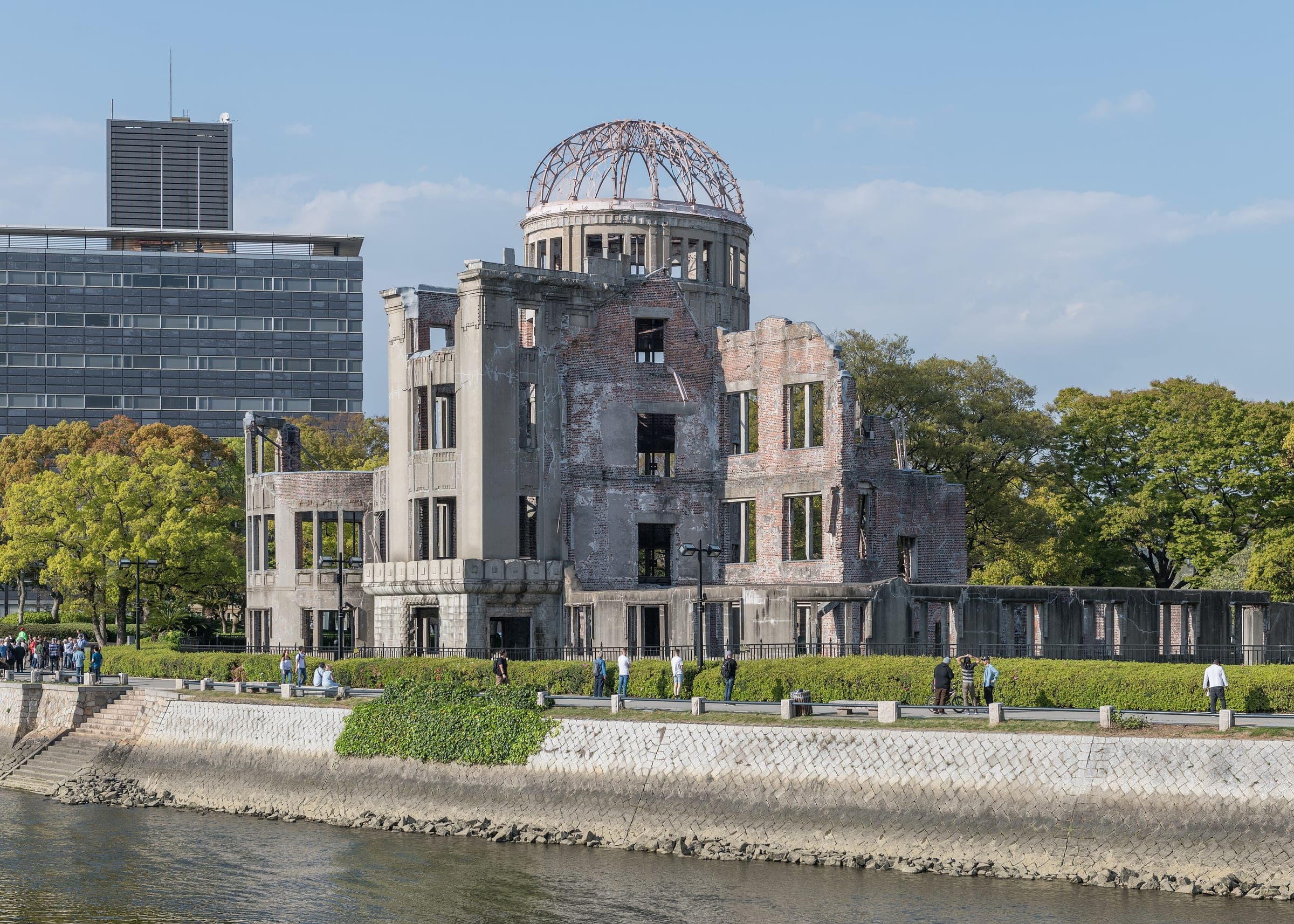 The ruined Atomic Bomb Dome stands on the bank of the Motoyasu River in central Hiroshima.