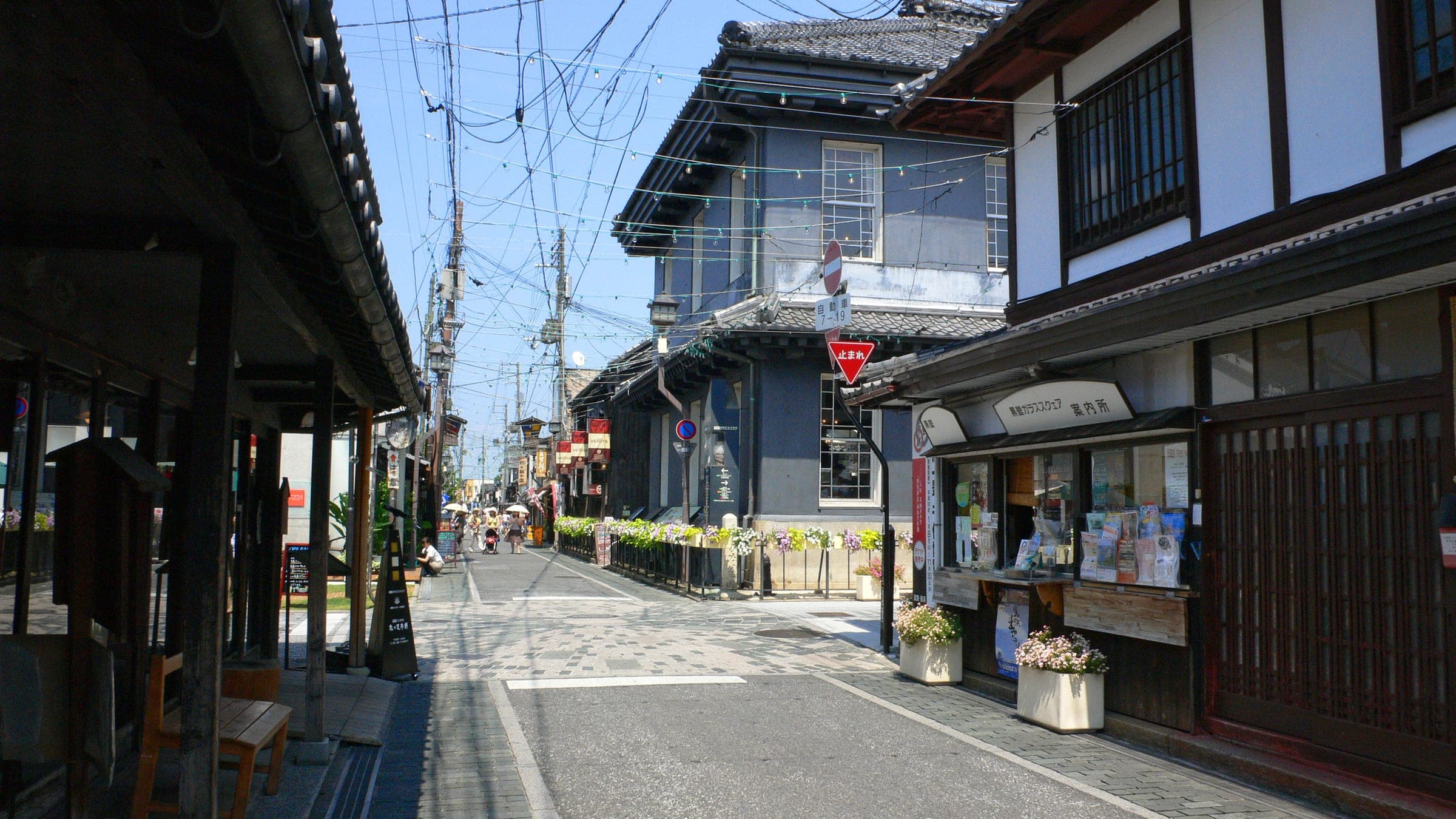 Old shopfronts line a quiet lane in the Kurokabe Square district of Nagahama