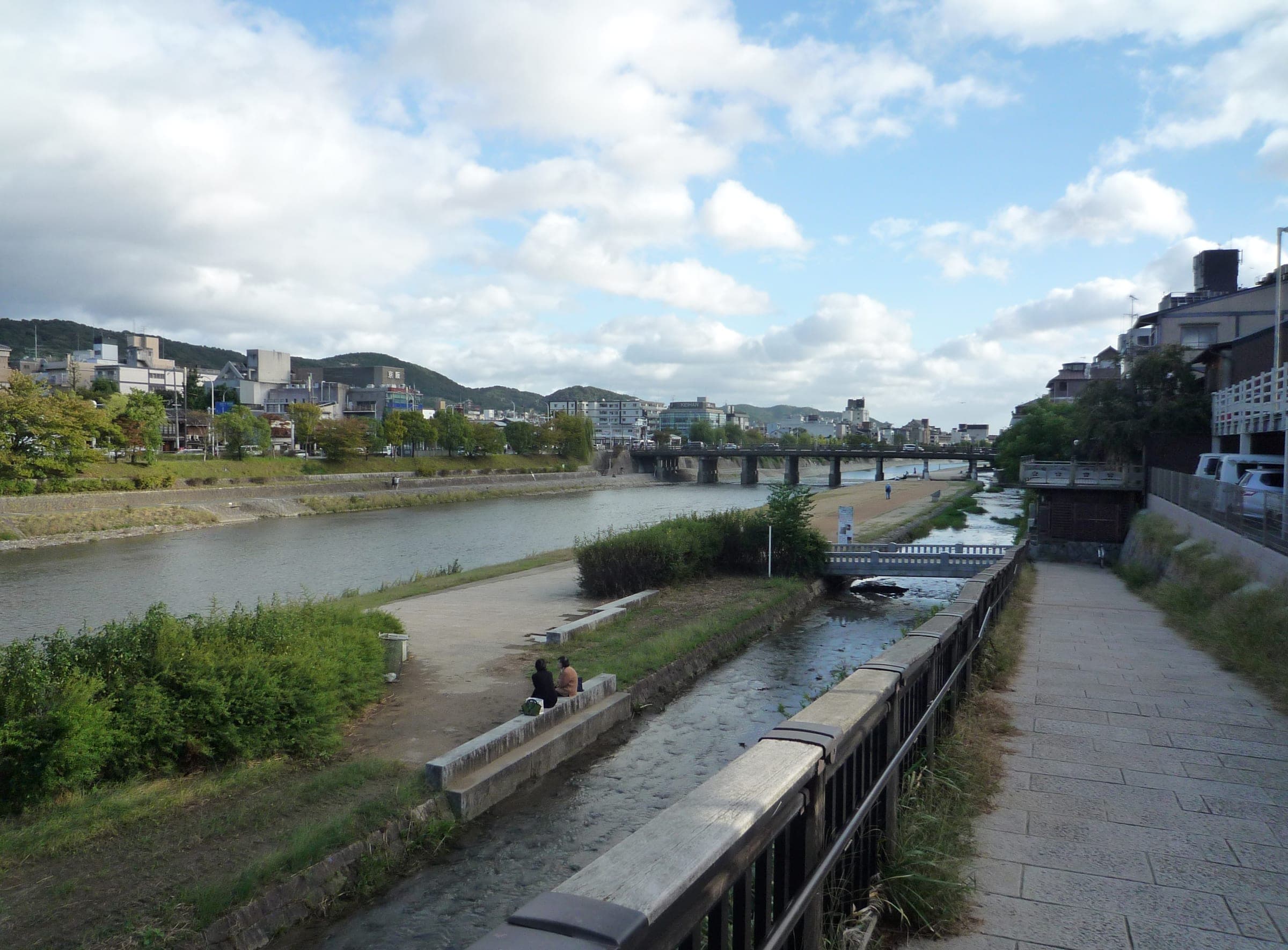 Riverside paths follow the Kamo River through central Kyoto near Pontocho on an October afternoon