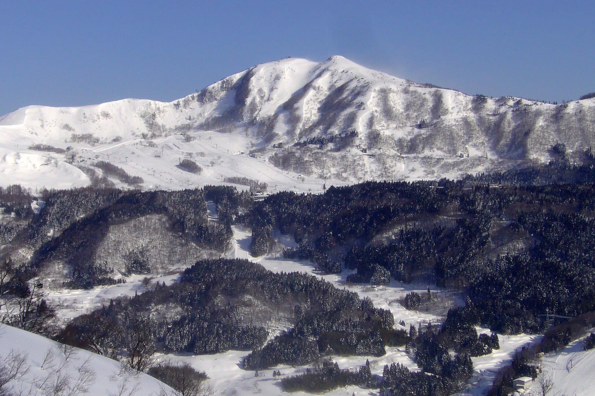 Snow covers Mount Hachibuse in February above the slopes the Hachi Kogen and Hachi Kita ski areas share