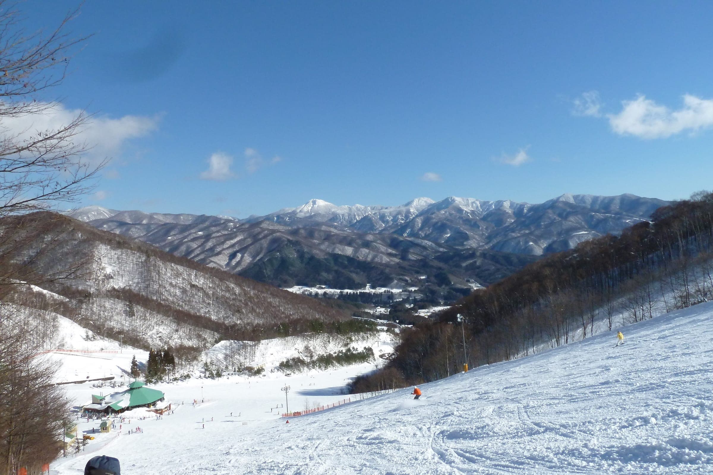 The Expert run at Oze Iwakura looks east to Mount Nikko-Shirane on a clear January day