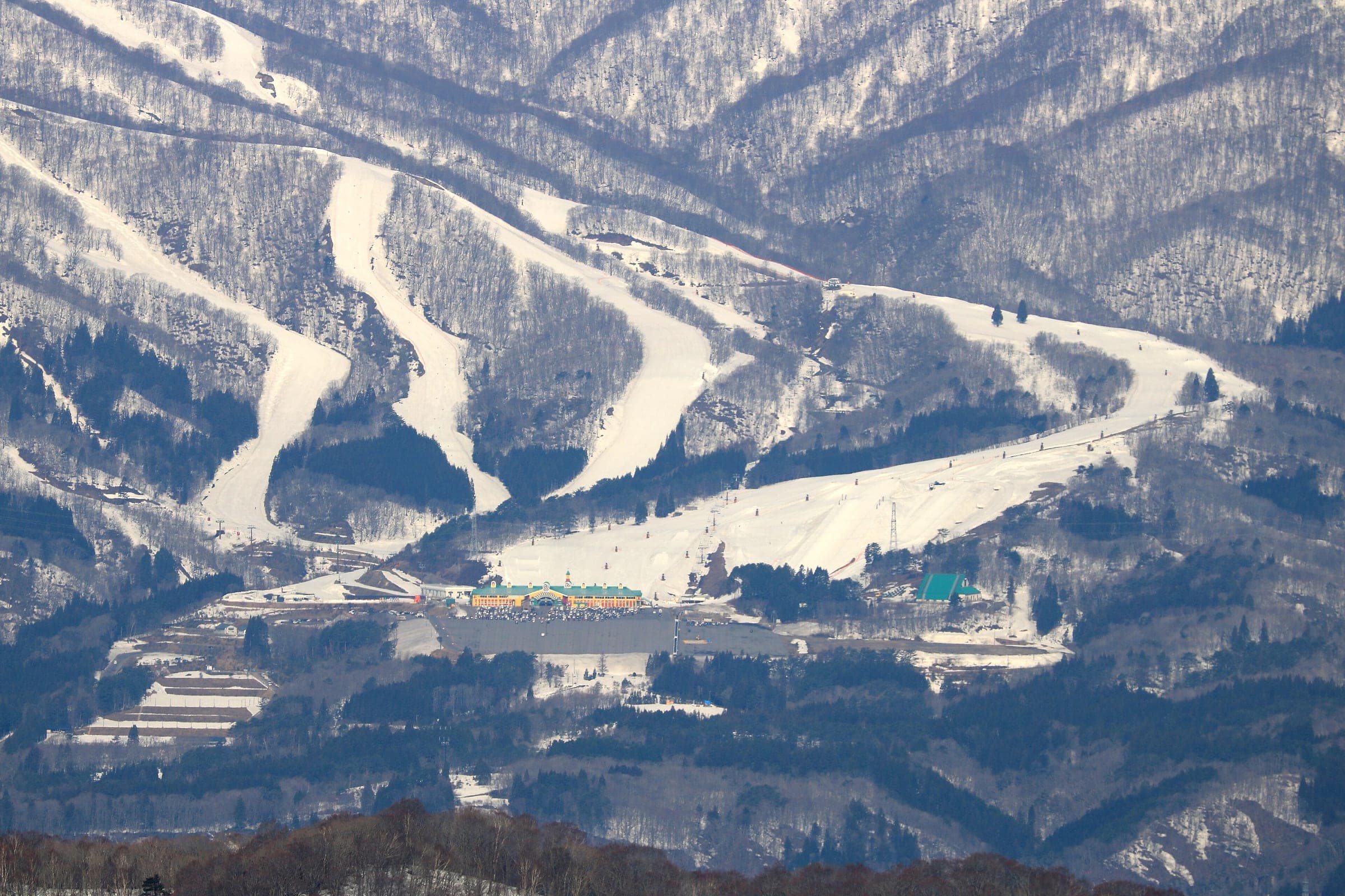 Takasu Snow Park's wide groomed runs sweep down to the base area on Mount Dainichi in March