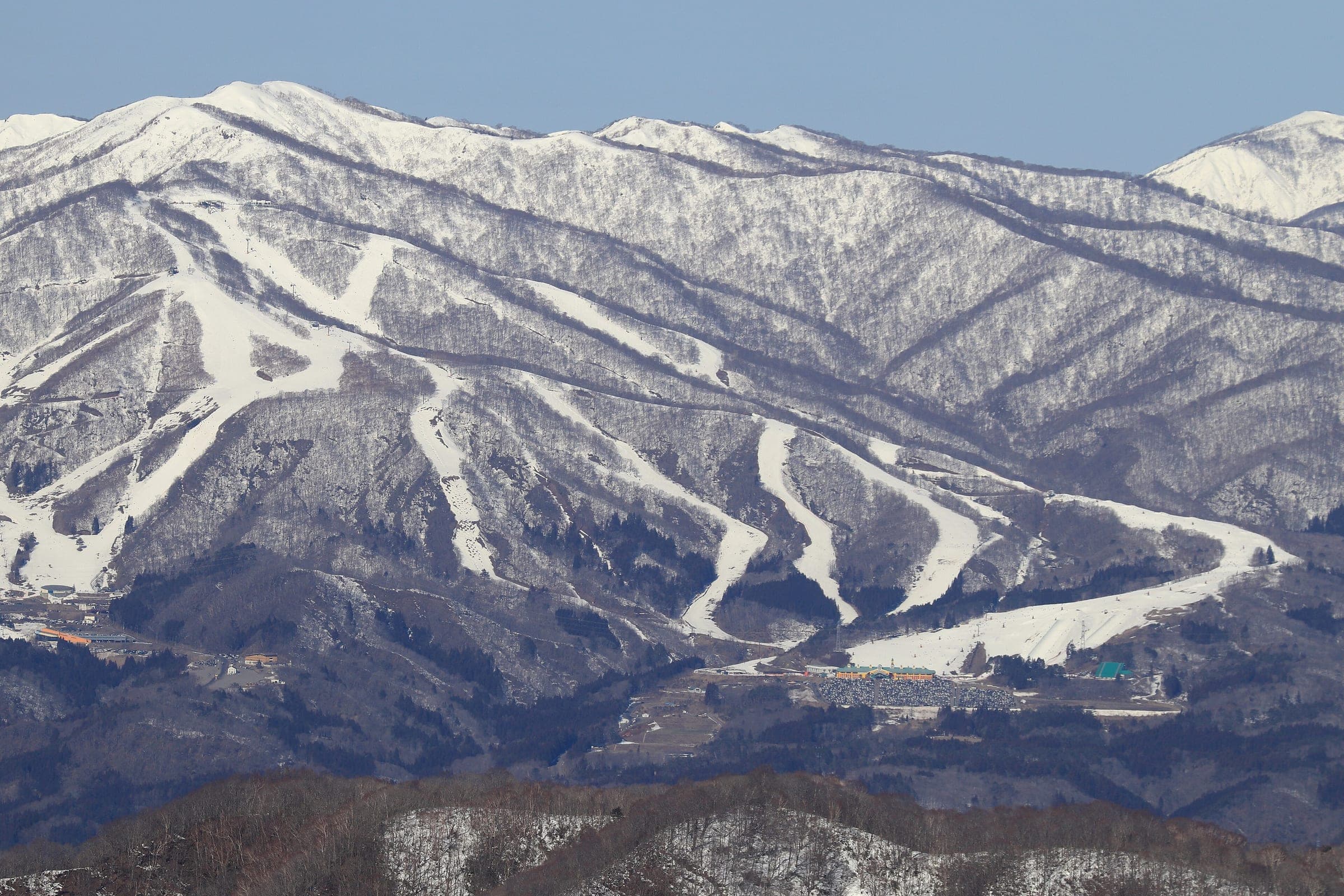 Takasu Snow Park's runs wind through snowy forest on Mount Dainichi in March
