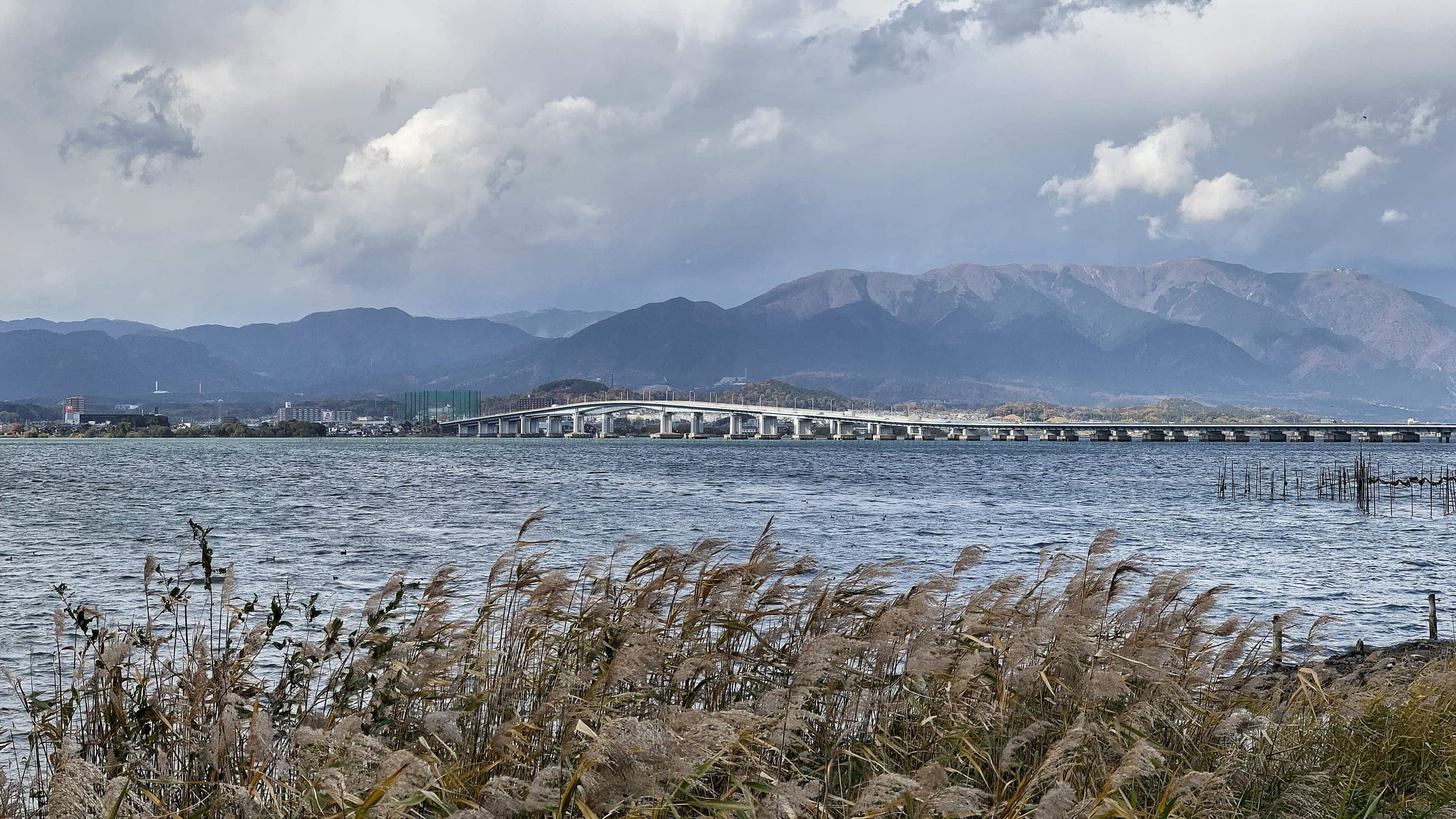 Lake Biwa Bridge crosses the narrows of the lake below the Hira mountains in late November