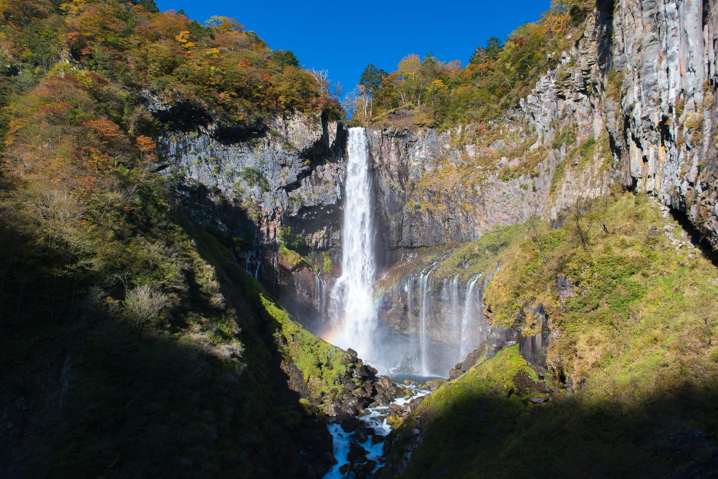 Kegon Falls drops nearly 100 metres down a basalt cliff into a sunlit gorge near Nikko