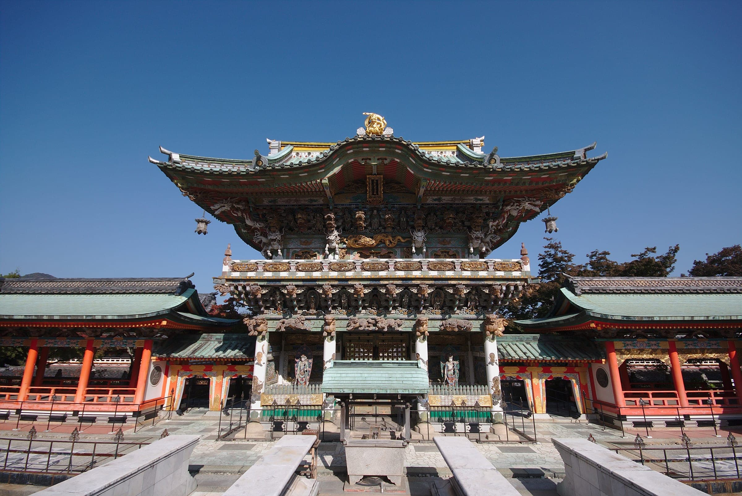 A carved gate in the style of Nikko leads to the upper level of Kosanji Temple in Setoda.