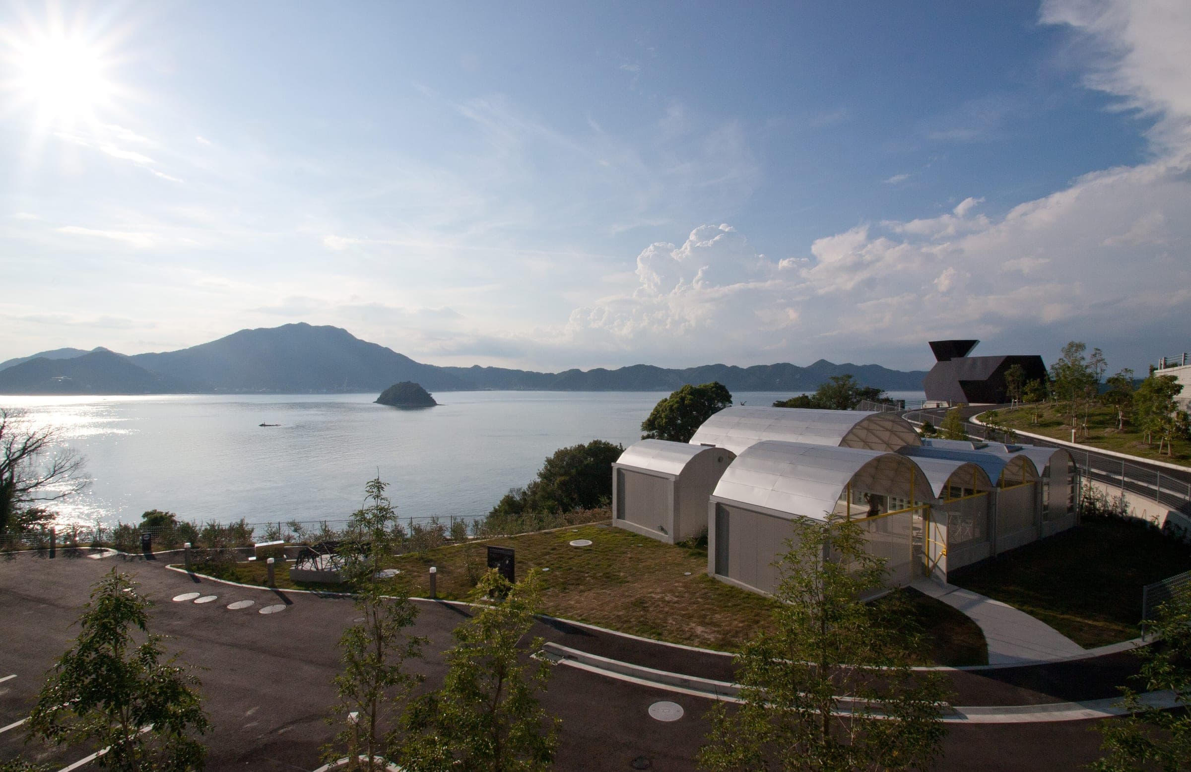 The vaulted roofs of the Silver Hut at the Toyo Ito Museum face the sea on Omishima.