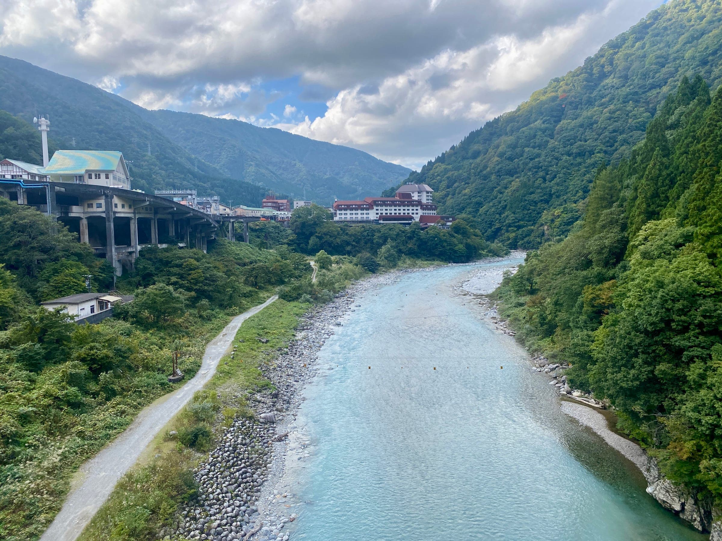 The Kurobe River flows out of the mountains past the hotels of Unazuki Onsen